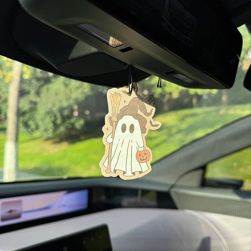 a friendly ghost wearing a classic Santa hat Intercontinental Hanging Car Air Freshener – GW1493