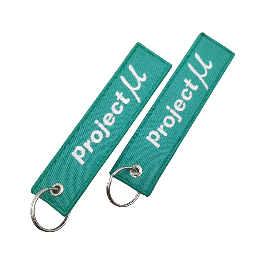 Double-Sided Embroidered Fabric Key Tag – 13 Designs